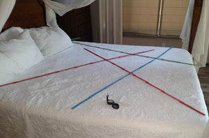 Geopathic stress found on a bed.  Hartmann lines (also called Global Grid lines) and Curry lines.